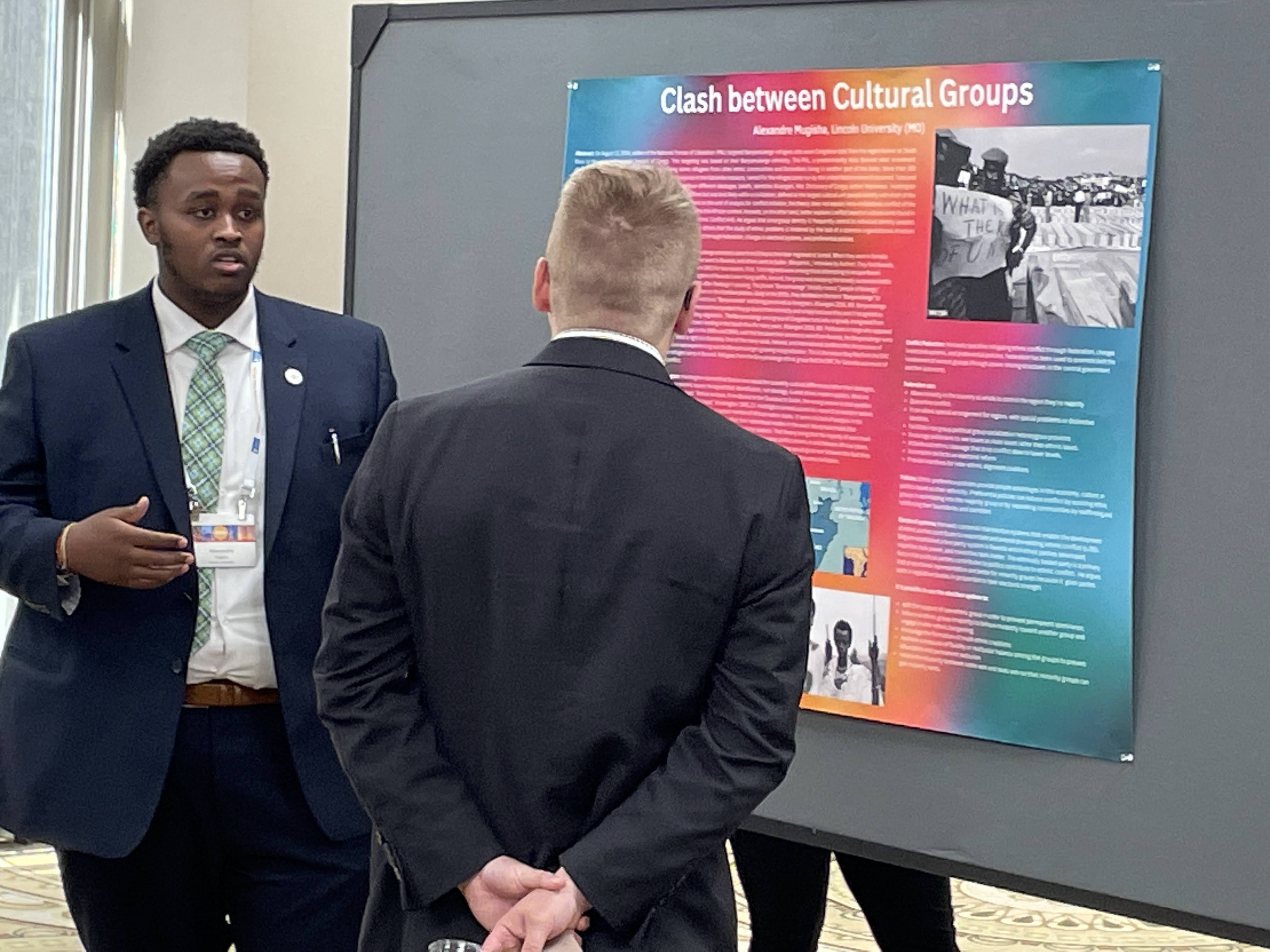 Sharing insights and ideas — Senior Alexandre Mugisha presents his research at the MPSA Conference.