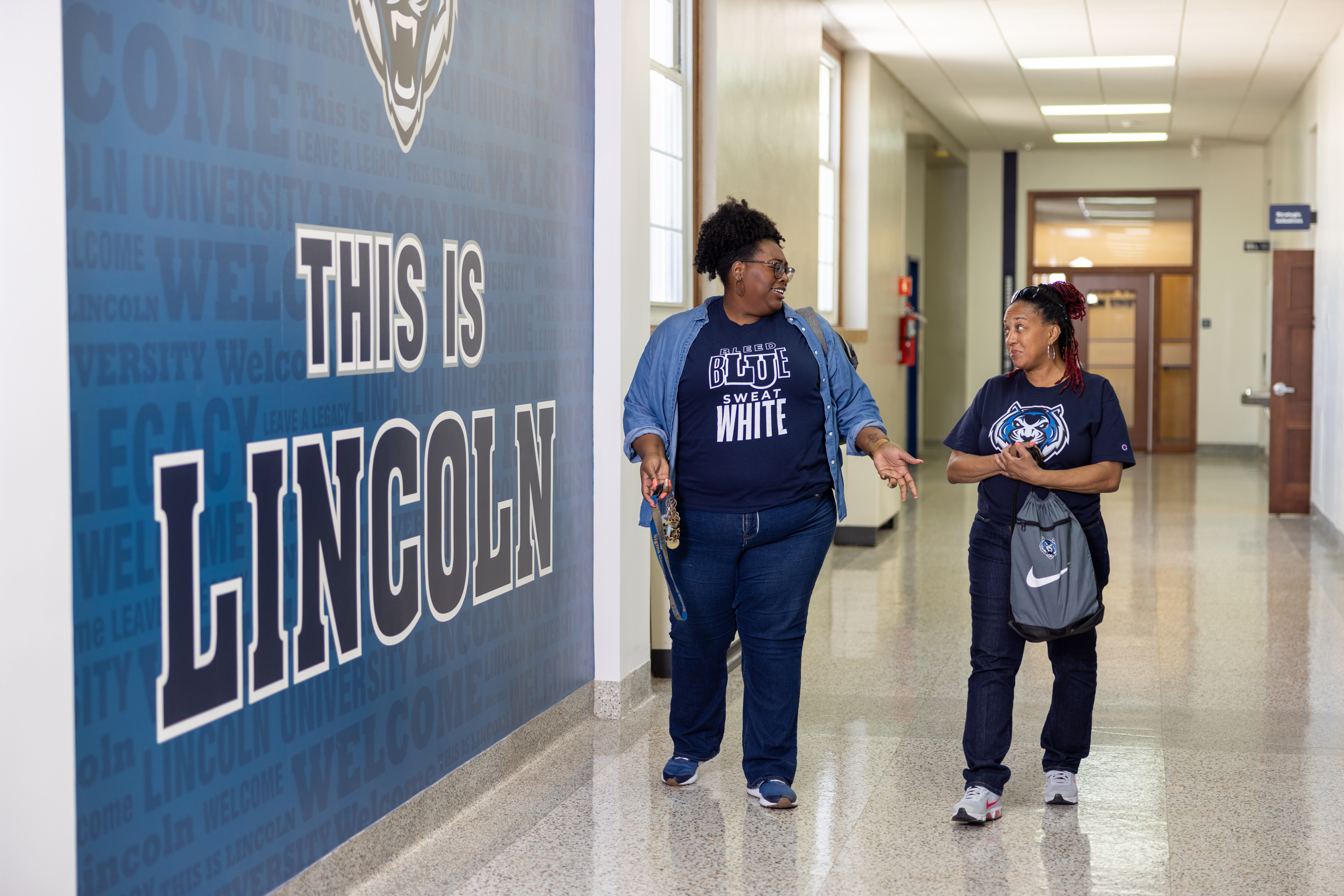 students walking in school hallway