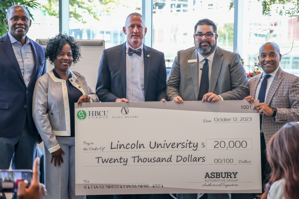 Senator Karla May presents a check for $20,000 to Lincoln University