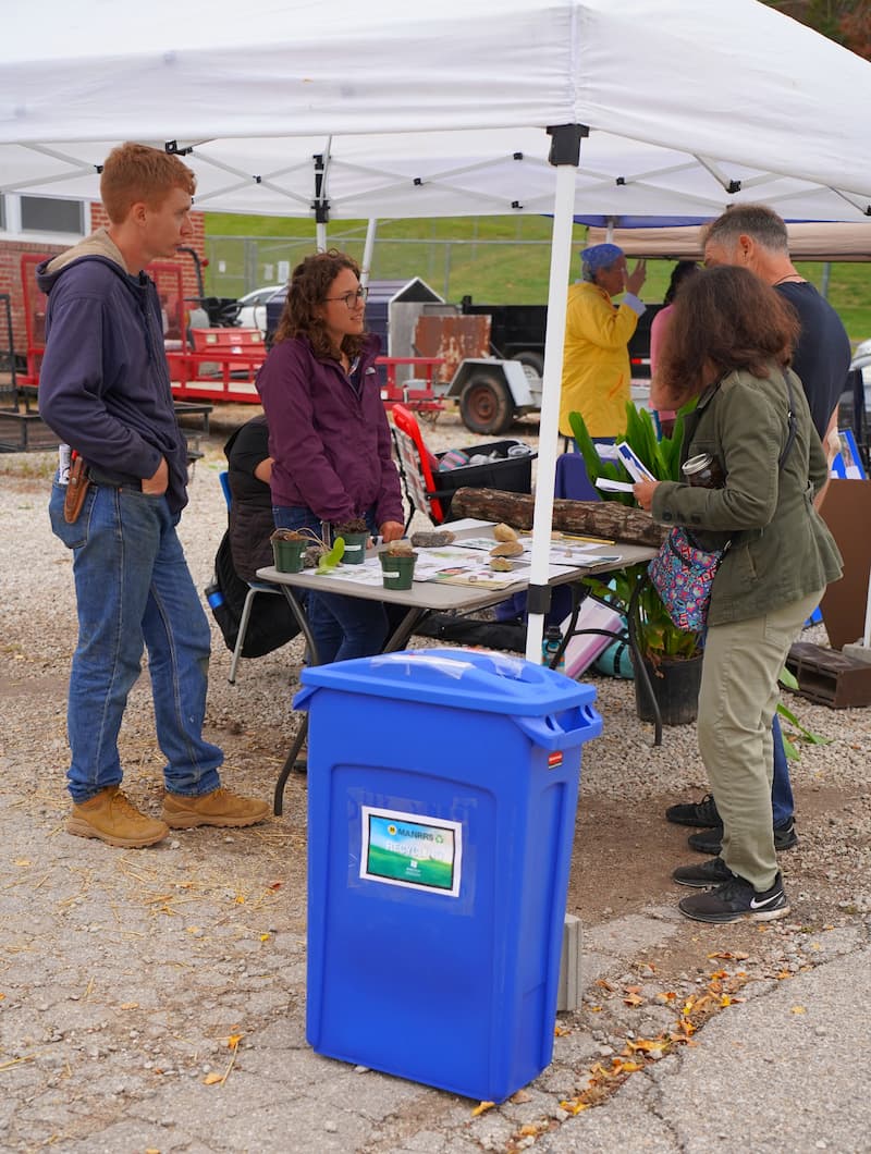 Raelin Kronenberg of the Forestry and Natural Resource Management Program speaks to visitors on forest farming and understory specialty crops