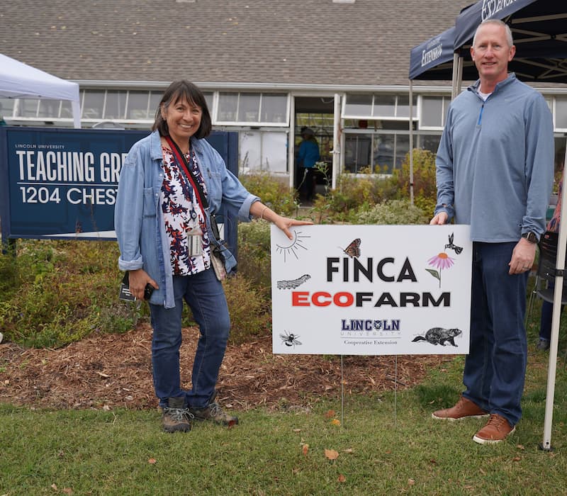 Dr. Nadia Navarrete-Tindall and President Dr. John Moseley take a photo together