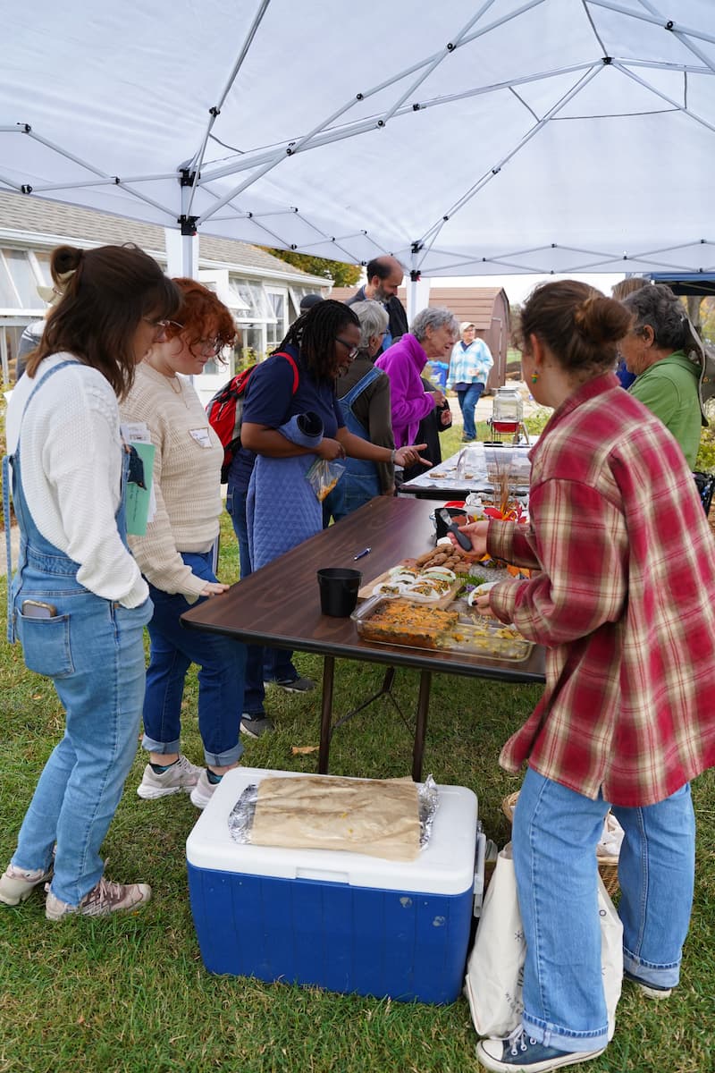 Attendees sample a variety of foods from the Dining Wild exhibit