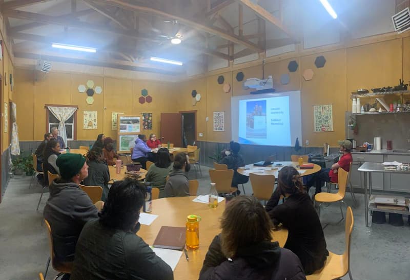 Students in classroom learning about market gardening