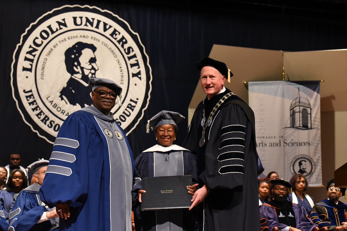 Dorothy Lathan receives honorary degree during Lincoln University’s 2025 commencement ceremony alongside university leadership.