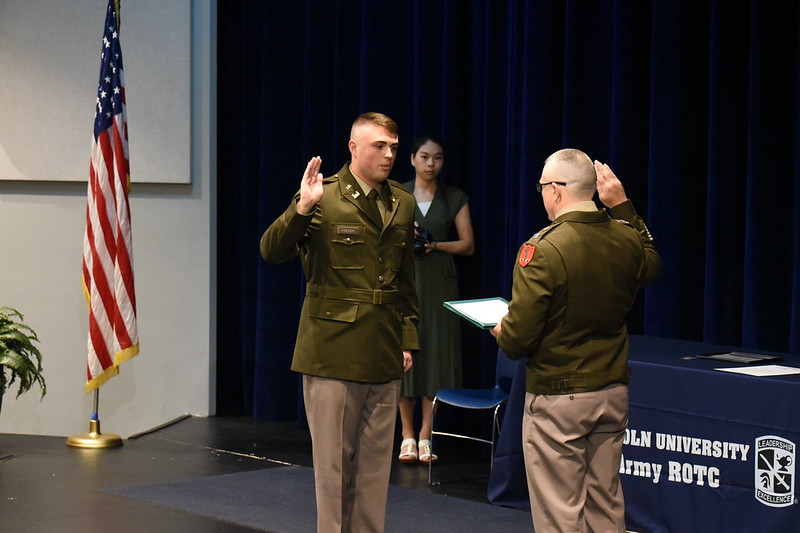 Cadet Blake Fischer is sworn in as a second lieutenant in the U.S. Army at his commissioning ceremony.