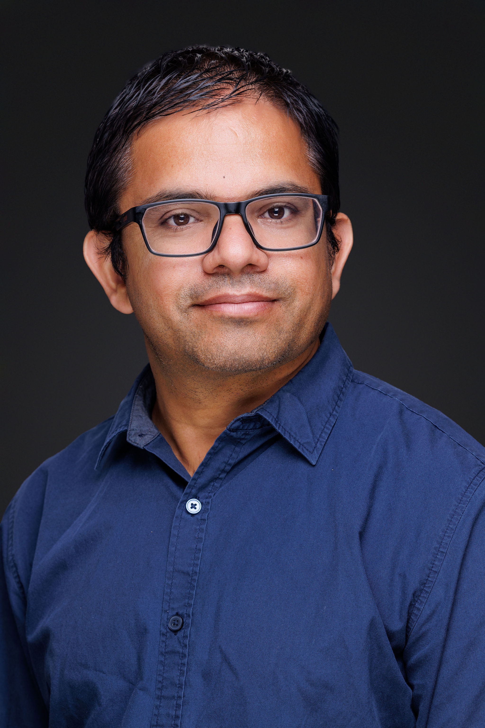 Dr. Mohan Acharya headshot