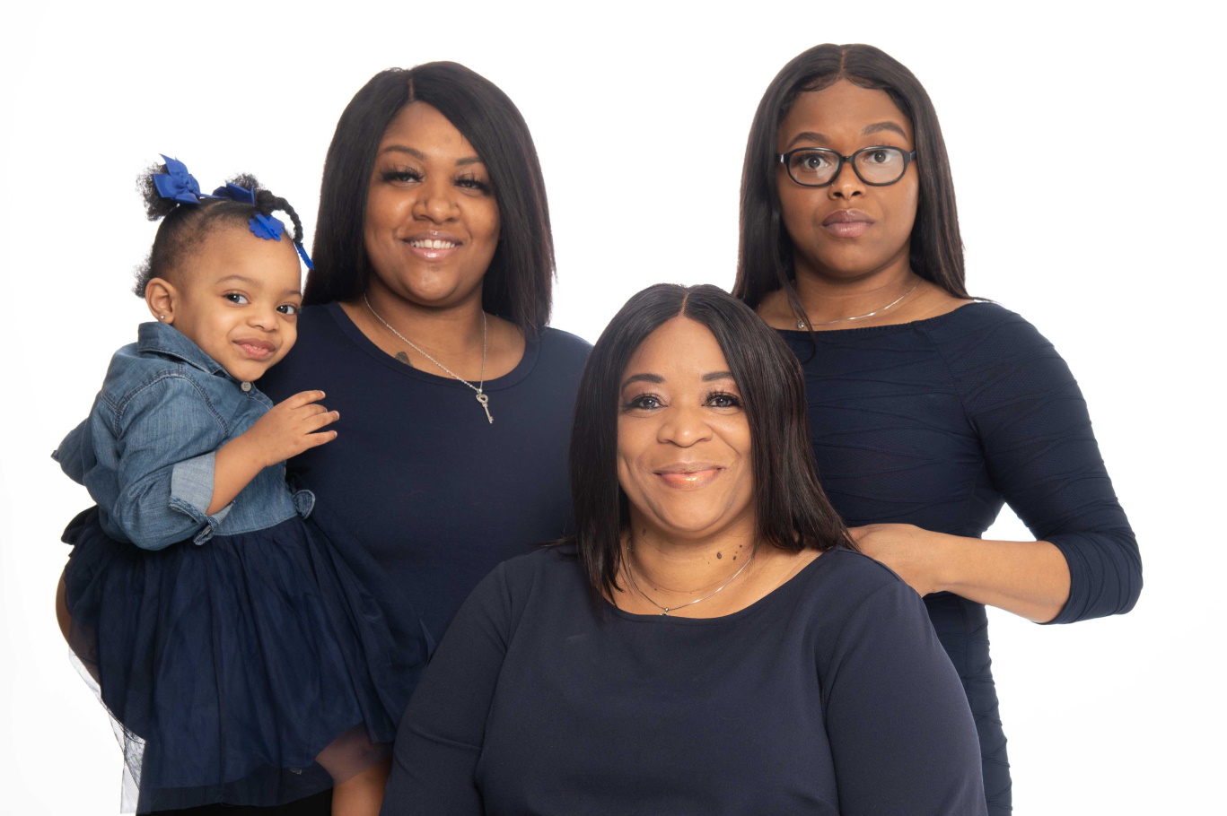 The Lewis family. From left to right: Naomi (granddaughter), Ja'Nia (daughter), Joanna, Ja'Nae (daughter and LU graduate).