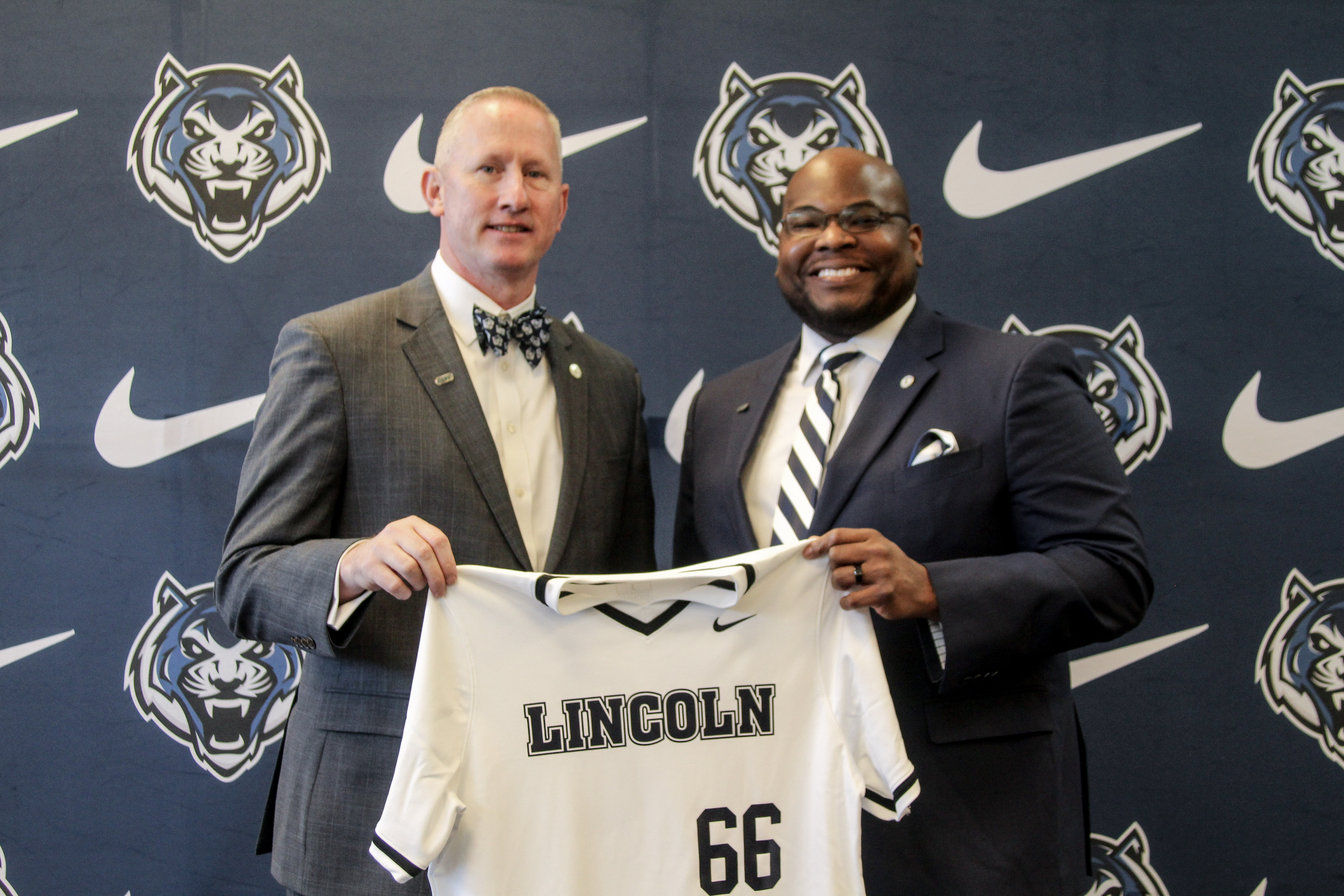  Above, President Moseley and Vice President for Advancement, Athletics, and Campus Recreation Dr. Kevin Wilson display a LU Blue Tigers baseball jersey.