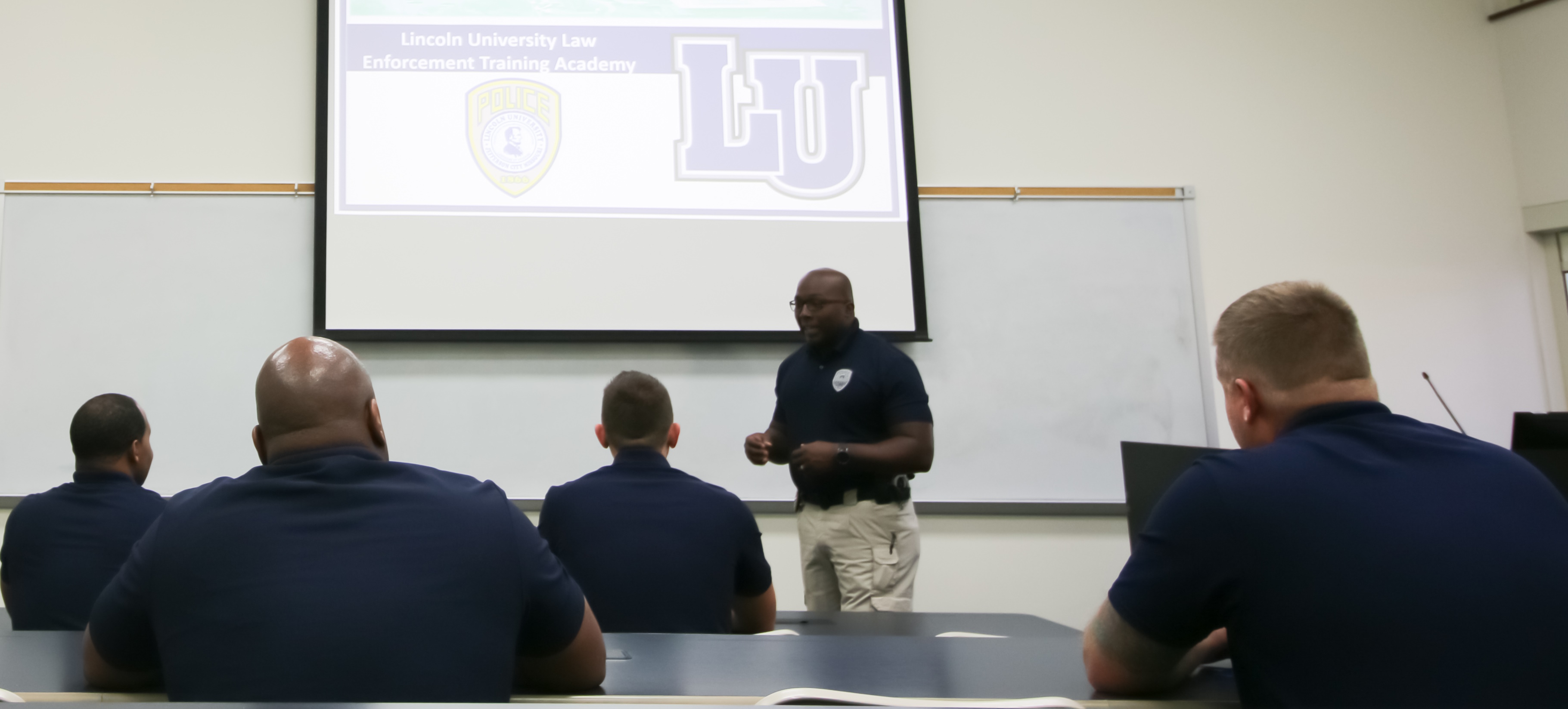 Chief Gary Hill instructs students in during a classroom session at Lincoln's Law Enforcement Training Academy.
