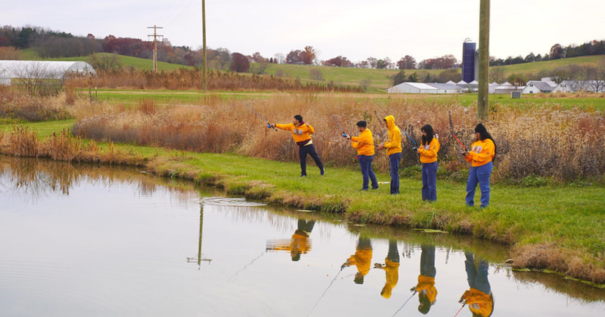 Students from Booker T. Washington engage in fishing activities at Lincoln University's Washington Carver Farm.