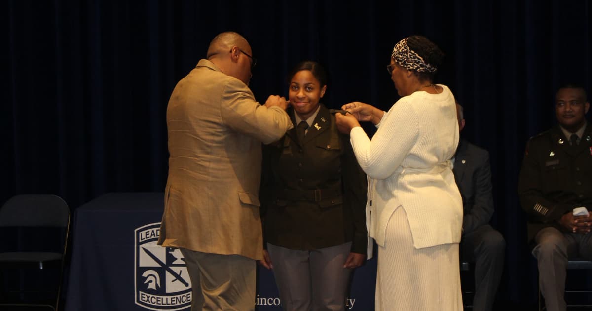 Newly commissioned cadet receives pin