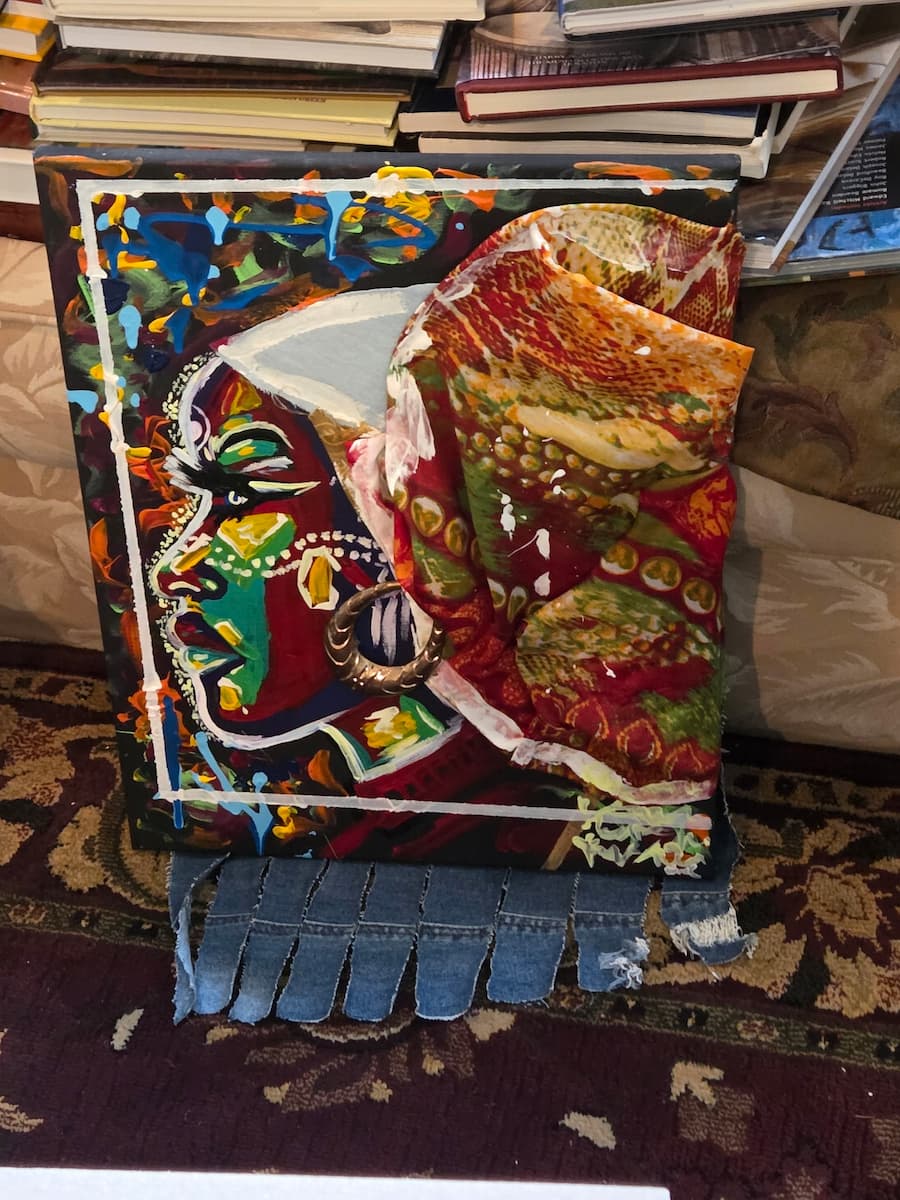 A colorful painting of a woman's side profile.