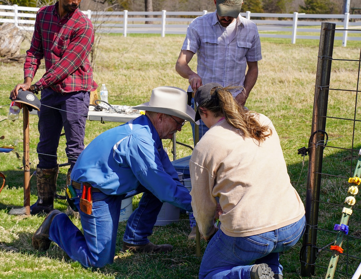 Mark Green leads a hands-on practice demonstration of permanent fencing installation at a Lincoln University Cooperative Extension training event.