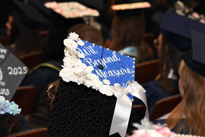 A Lincoln University of Missouri graduate cap with the text, "Wit Beyond Measure."