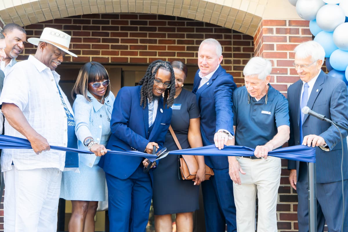 From left to right: Lincoln University Curators Terry Rackers, Vernon “Vitto” Bracey, President Victor Pasley, Tina Shannon, SGA President Jesse Canamore, Belinda Farrington, University President John Moseley, Richard Calahan, and Richard Popp participated in the ribbon-cutting ceremonies for Dawson Hall and the Scruggs University Center cafeteria renovations on Aug. 12.