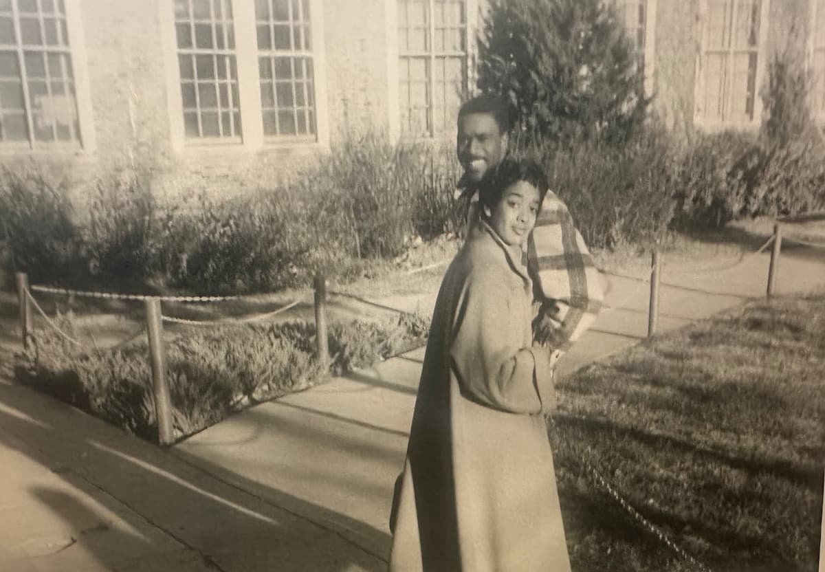 Black and white photograph of Herschel L. Garrett, Jr. and Shirley M. Curry in front of Page Library.