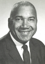 Black and white headshot image of Dwight T. Reed.