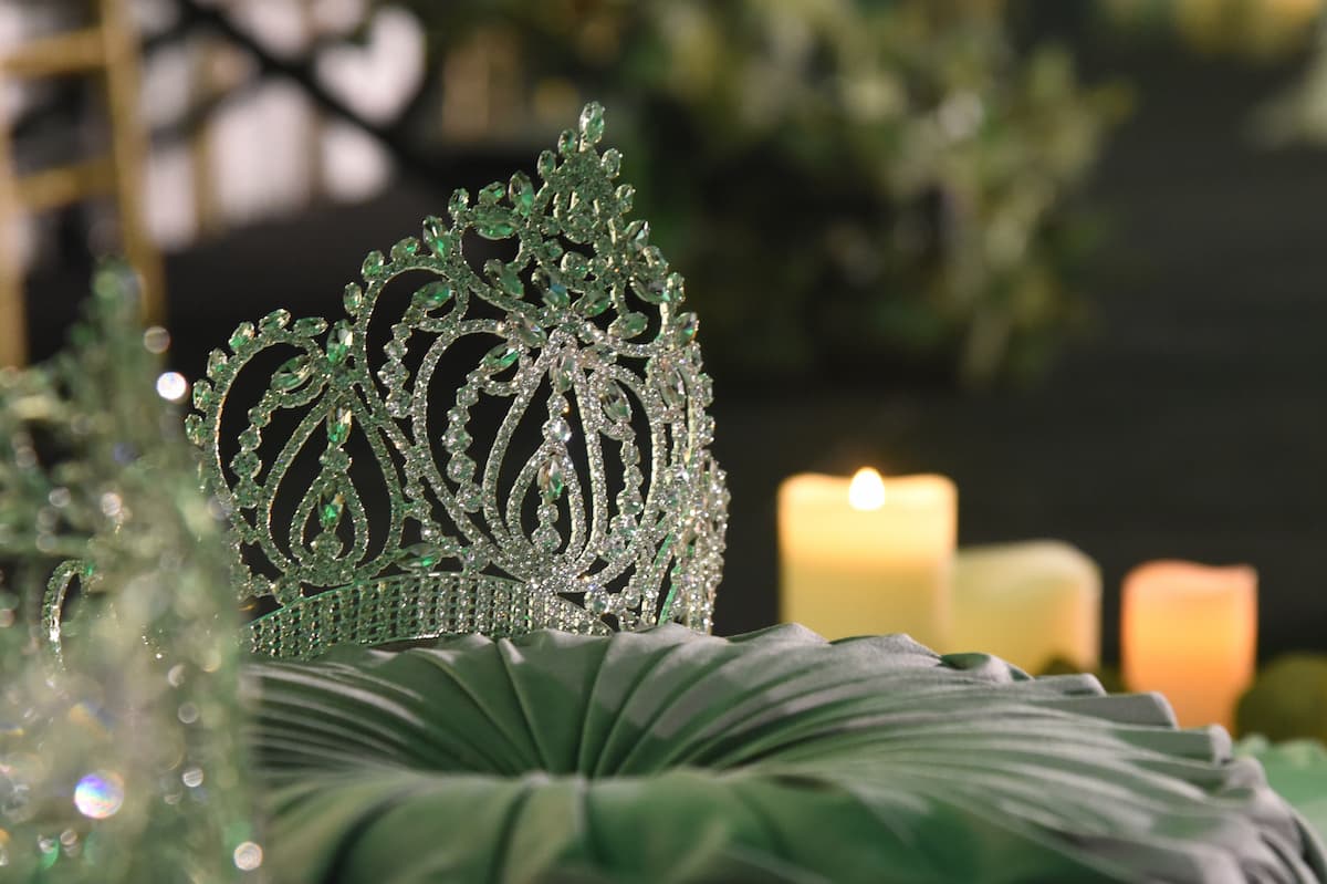 A ceremonial crown sits beneath stage lighting before the 2025 Coronation begins at Lincoln University.