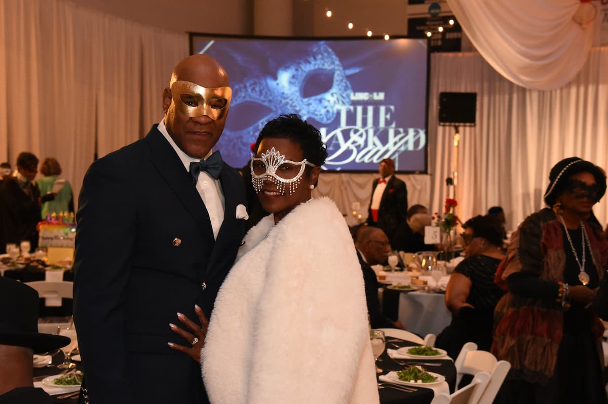 Two people are dressed in formal wear and masquerade masks while at the 2025 Masked Ball at Lincoln University.