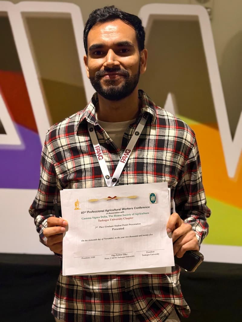 A person holding a piece of paper.