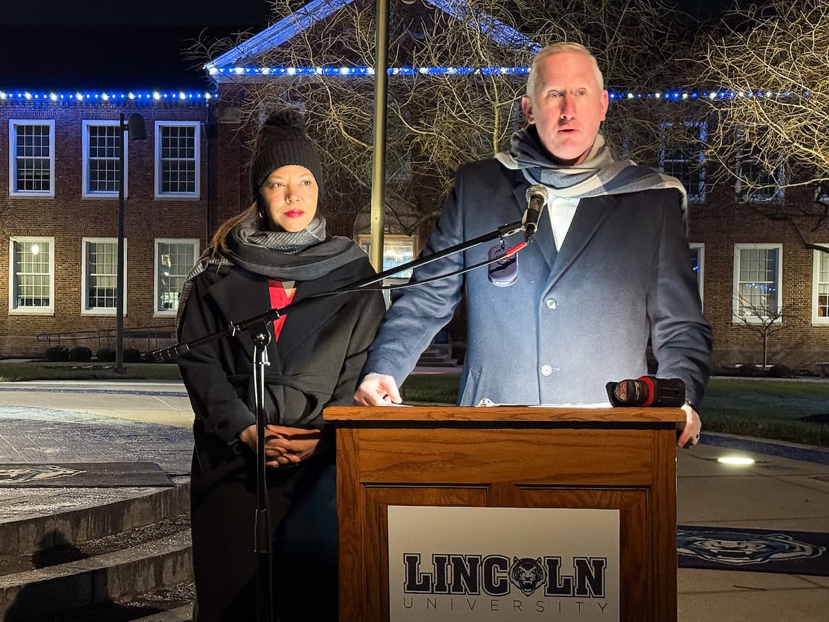 President Moseley stands at the podium to speak while at the Holiday Extravaganza.