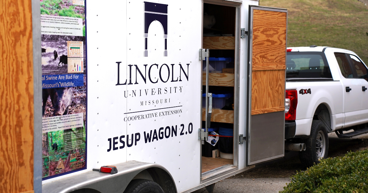 Jesup Wagon 2.0 trailer with Lincoln University Cooperative Extension branding parked outdoors as part of a mobile agricultural education setup.