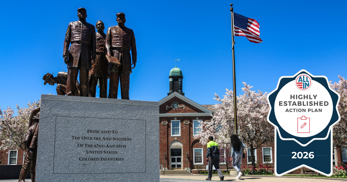 Campus photo of Lincoln University's Soldier's Memorial with a seal for the High Established Action Plan for the 2026 election cycle.