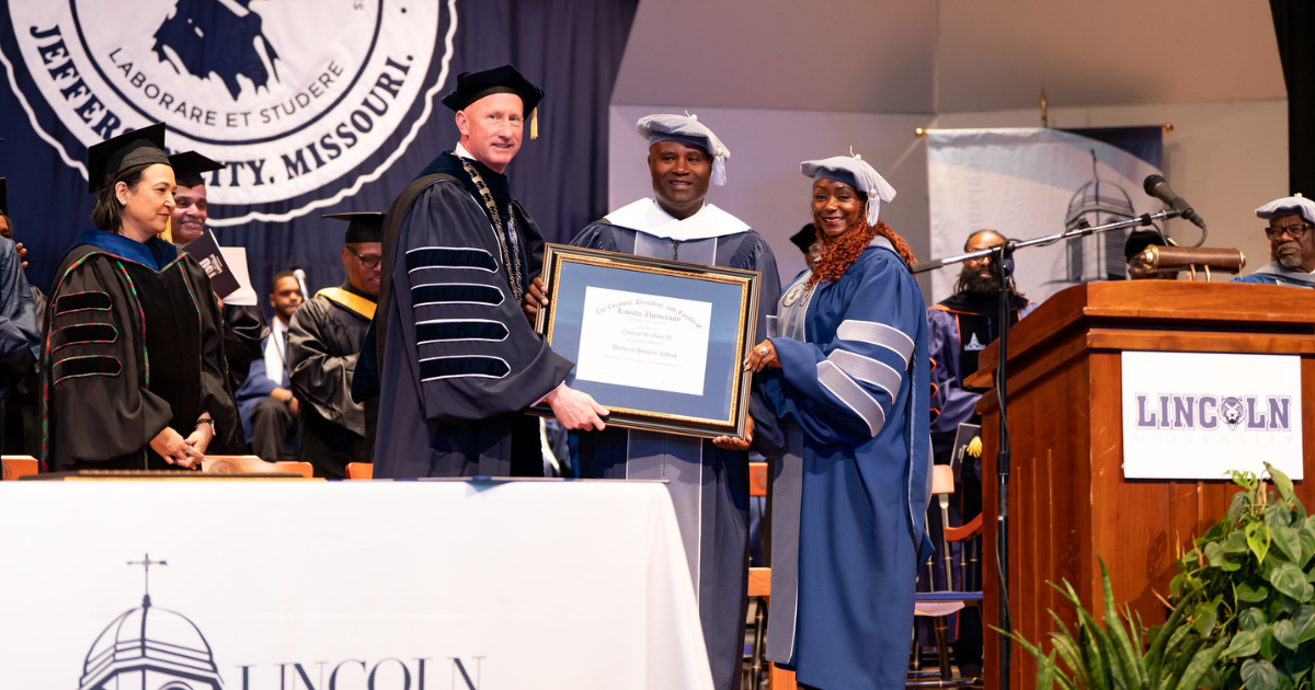 Lincoln University officials present an honorary degree to preservationist Crockett Oaks III during the Spring 2026 commencement ceremony.