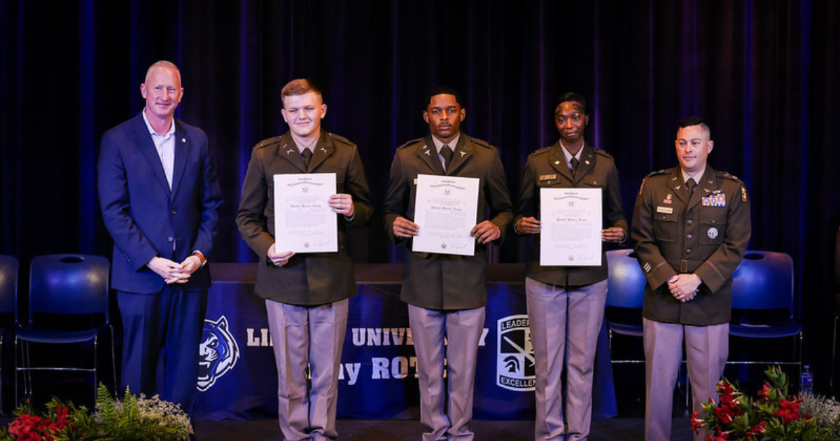 Lincoln University ROTC graduates pose with military leaders during the Spring 2026 commissioning ceremony.