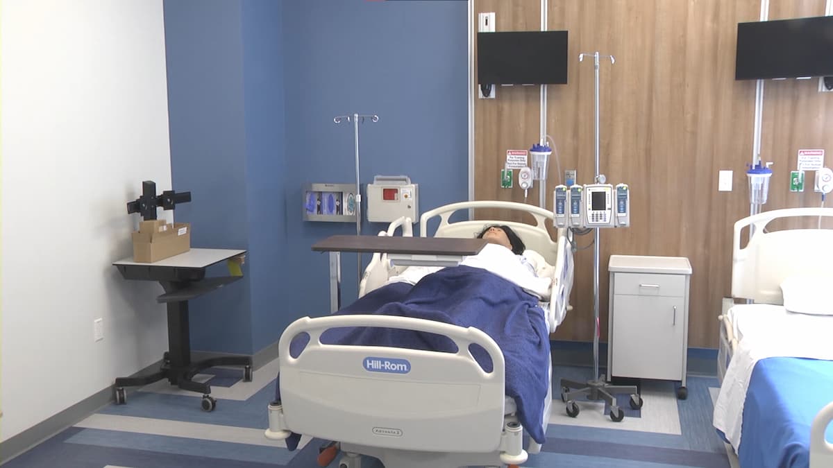 A patient simulator is displayed in one of the patient care stations inside the nursing simulation laboratory at Lincoln University's Health and Security Sciences Institute. The simulation lab provides students with realistic clinical experiences in a safe, controlled learning environment.