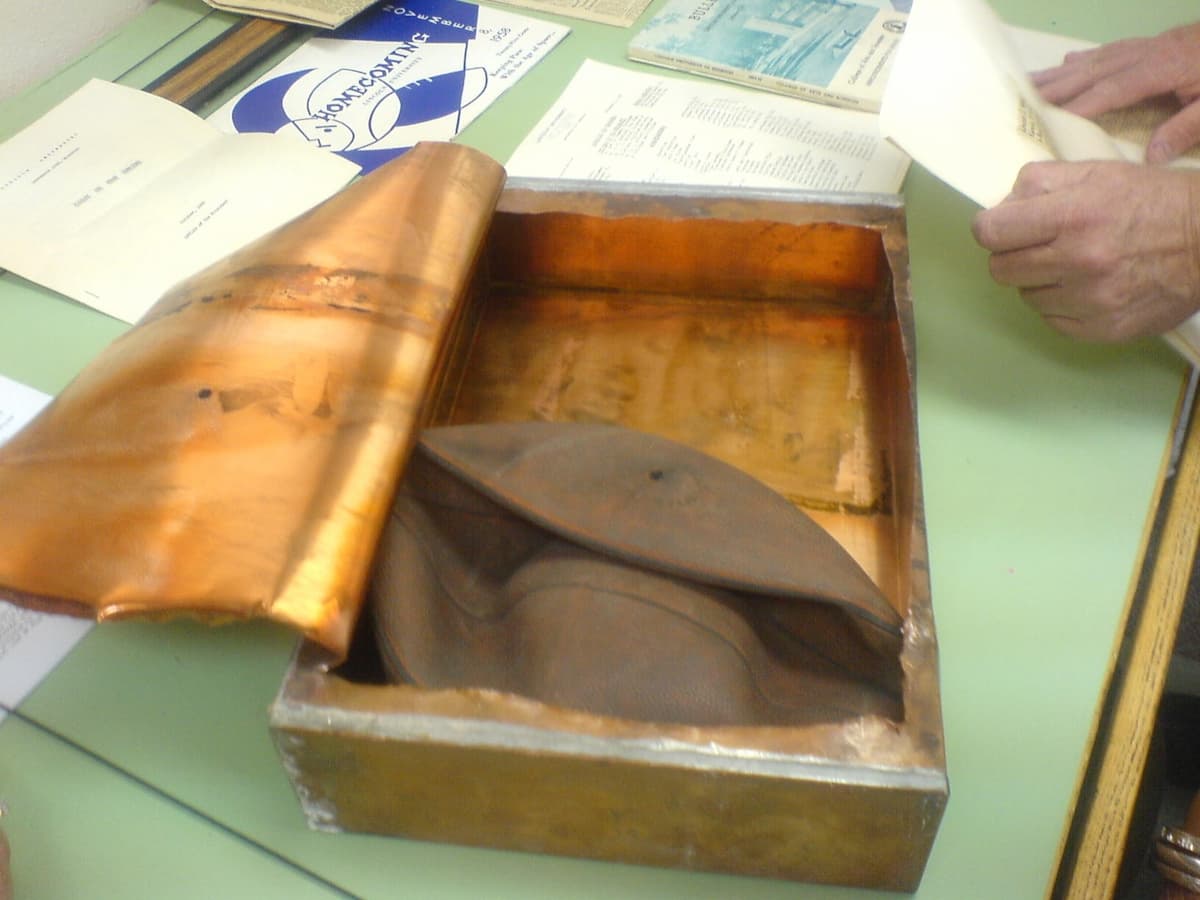 Contents of the Jason Gym time capsule, which included Lincoln University literature from 1958 and a deflated basketball.