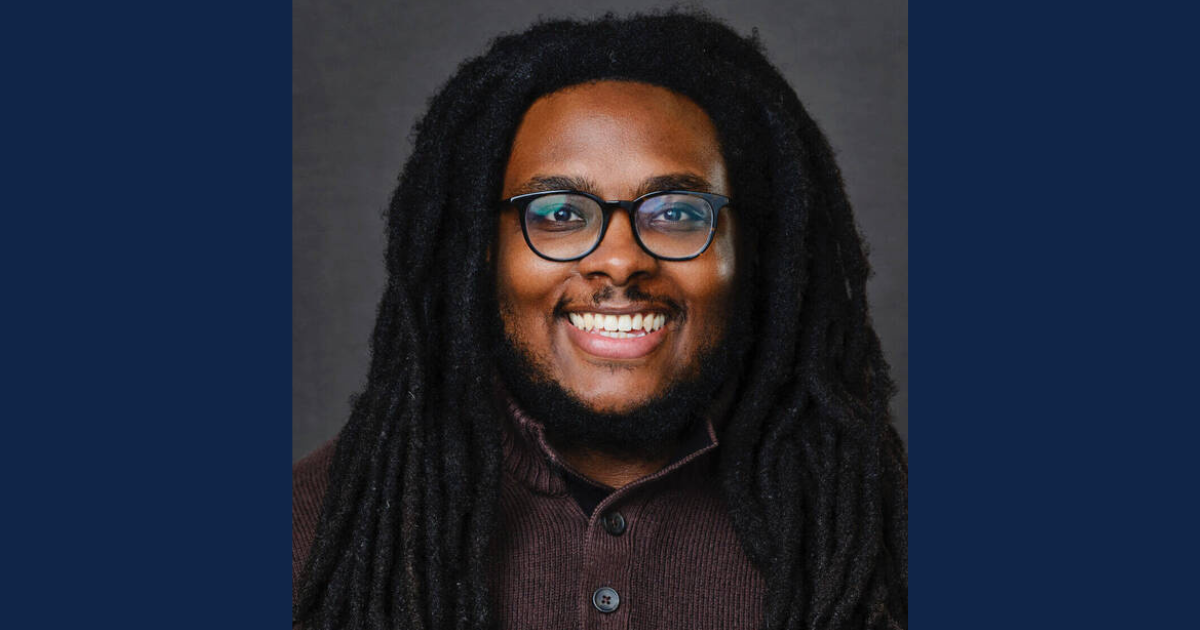 Headshot image of Adam McNeil. 