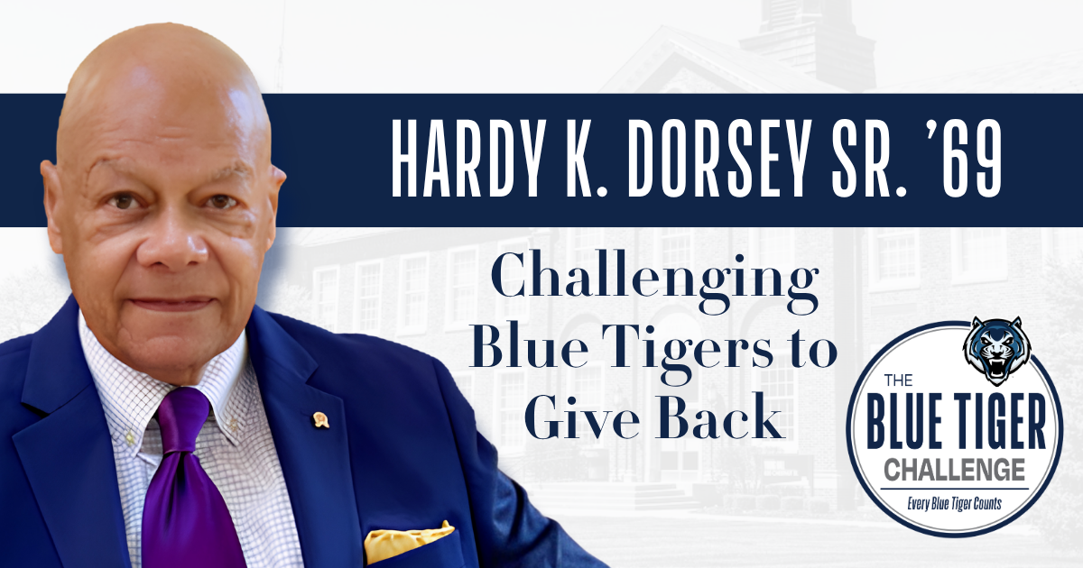 Headshot image of Hardy Dorsey in a blue suit, white shirt and purple tie.