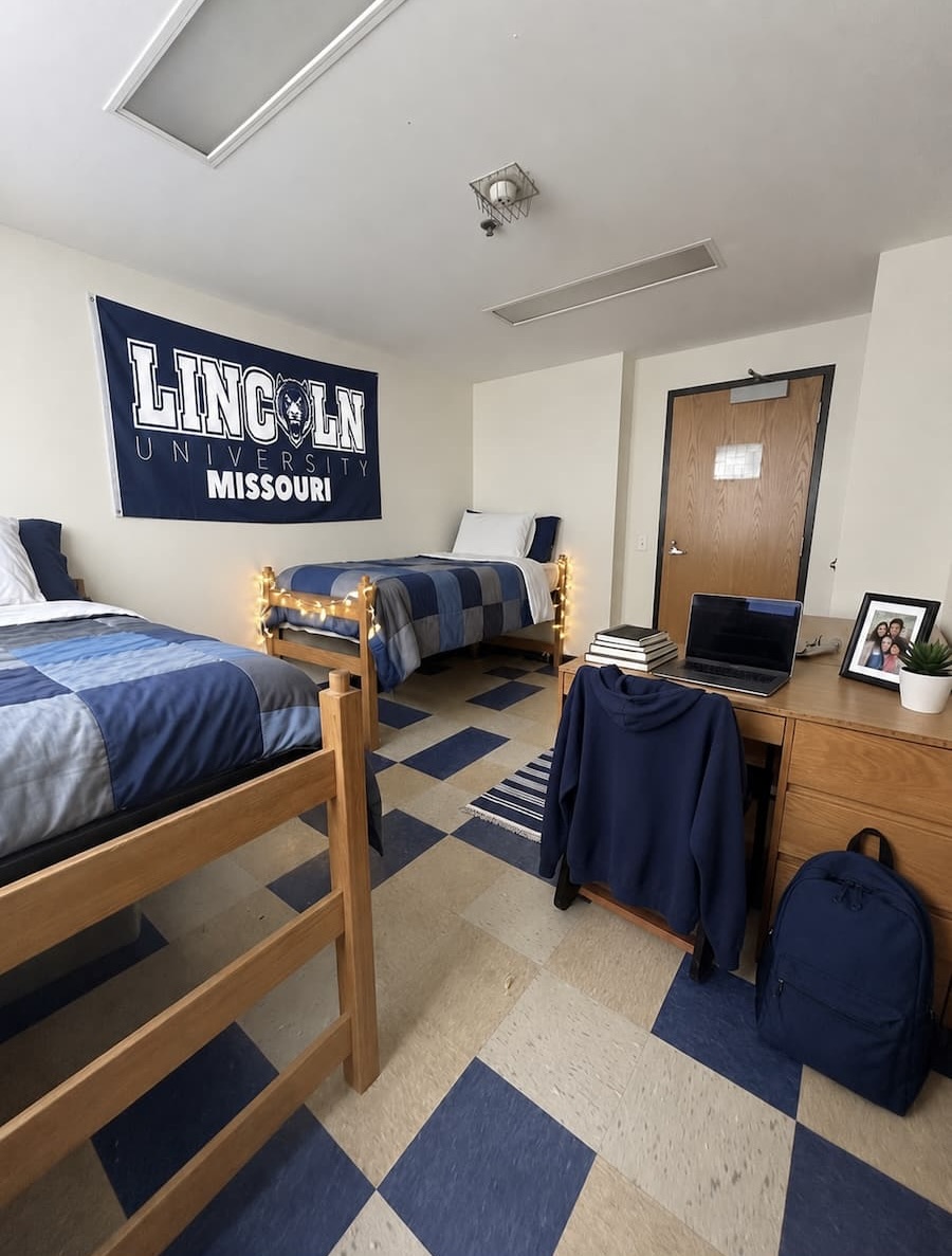Tull Hall dorm room with two beds and a desk.